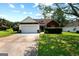 Charming single-Gathering home with a well-maintained lawn, attached two-car garage, and classic curb appeal at 8180 Chapman Ter, Mcdonough, GA 30252