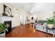 Bright living room boasting hardwood floors, a cozy fireplace, and a comforting ambiance at 8180 Chapman Ter, Mcdonough, GA 30252