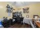 A tidy office space with laminate flooring, black computer and desk at 8180 Chapman Ter, Mcdonough, GA 30252