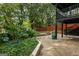 Outdoor patio area with well-maintained garden featuring mature landscaping at 98 Maddox Dr, Mcdonough, GA 30252