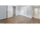 Bright basement room with large closet and new flooring, providing a comfortable and versatile living space at 98 Maddox Dr, Mcdonough, GA 30252