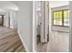 Hallway view showcasing seamless flow to the bathroom and bedroom at 409 Deergrass Trl, Peachtree City, GA 30269