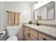 Bathroom featuring a modern sink, granite countertop, and light wood cabinets at 437 Mays Rd, Stockbridge, GA 30281