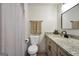 Bathroom with a shower, toilet, and modern sink and cabinets at 437 Mays Rd, Stockbridge, GA 30281