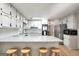 Spacious kitchen offers ample cabinet space, granite countertops, and a breakfast bar, perfect for entertaining at 437 Mays Rd, Stockbridge, GA 30281