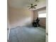 Bedroom featuring carpet, ceiling fan, and bare walls at 2884 Haddon Dr, Rex, GA 30273