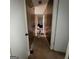Hallway with wood-paneled walls at 2884 Haddon Dr, Rex, GA 30273