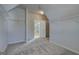 Walk-in closet with shelving and view of the bathroom through glass shower doors at 315 Westfall Ter # 226A, Loganville, GA 30052