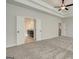 Large primary bedroom featuring trey ceiling, ceiling fan and en suite bathroom at 315 Westfall Ter # 226A, Loganville, GA 30052