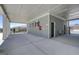 Community pool house featuring gray siding, white columns, emergency equipment and water fountain at 315 Westfall Ter # 226A, Loganville, GA 30052
