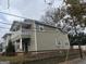 View of home featuring a charming balcony and fenced yard at 821 Beckwith Sw St, Atlanta, GA 30314