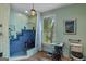Bathroom featuring tiled shower, quirky decor, and abundant light at 3498 Overland Trl, Ellenwood, GA 30294