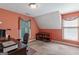 Bedroom with ample natural light and neutral carpeting, offering a versatile living space at 3498 Overland Trl, Ellenwood, GA 30294
