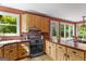 Well-lit kitchen with stainless steel oven and wood countertops, perfect for culinary adventures at 3498 Overland Trl, Ellenwood, GA 30294
