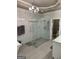 Bathroom featuring a glass walk-in shower and updated fixtures at 2643 Edgewater Ct, Jonesboro, GA 30236