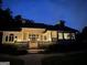 Exterior view of home at twilight with manicured landscaping and patio area at 2643 Edgewater Ct, Jonesboro, GA 30236