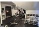 Home gym boasts extensive weight training equipment for a complete workout at 2643 Edgewater Ct, Jonesboro, GA 30236