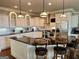 Elegant kitchen featuring island, stainless steel appliances, and breakfast bar at 2643 Edgewater Ct, Jonesboro, GA 30236