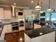 Well-equipped kitchen with island, stainless steel appliances, and breakfast bar at 2643 Edgewater Ct, Jonesboro, GA 30236