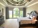 Luxurious bedroom with vaulted ceilings and views of the lake at 2643 Edgewater Ct, Jonesboro, GA 30236