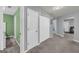 Hallway features closet space and seamless transition to other rooms in the home at 136 Glynn Addy Dr, Stockbridge, GA 30281