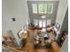 Lofted view of a cozy living room with high ceilings, fireplace, and large windows at 1561 Aiken Chafin Ln, Mcdonough, GA 30252