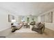 Finished basement featuring a comfortable seating area, neutral carpet, and bright light from the walkout exterior at 508 Hastings Dr, Peachtree City, GA 30269