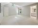 Spacious bedroom with vaulted ceilings, multiple windows providing natural light, and neutral carpeting at 508 Hastings Dr, Peachtree City, GA 30269