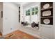 Charming breakfast nook with built-in seating, decorative pillows, and natural light from the window at 508 Hastings Dr, Peachtree City, GA 30269