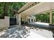 Exterior view of the Porte Cochere and a three-car garage at 508 Hastings Dr, Peachtree City, GA 30269