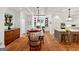 Elegant dining room with terracotta floors, white ceiling, and a table with chairs at 508 Hastings Dr, Peachtree City, GA 30269