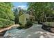 Charming home exterior features a well-manicured lawn, a paved driveway, and a welcoming facade at 508 Hastings Dr, Peachtree City, GA 30269