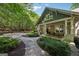 Inviting front porch featuring an American flag, comfortable seating and stylish decor at 508 Hastings Dr, Peachtree City, GA 30269