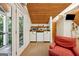 Cozy living area features a kitchenette and access to a balcony at 508 Hastings Dr, Peachtree City, GA 30269