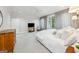 Bright bedroom with a large bed, french doors to a patio, and views of the backyard at 508 Hastings Dr, Peachtree City, GA 30269