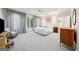 Spacious main bedroom with hardwood floors, bright light from windows and access to a balcony at 508 Hastings Dr, Peachtree City, GA 30269