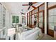 Sunroom with comfortable seating, great natural light, and fireplace in view at 508 Hastings Dr, Peachtree City, GA 30269