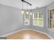 Bright dining room with modern pendant lighting and large windows at 506 Brewer Dr, Locust Grove, GA 30248