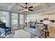 Open-concept living room that flows into the dining and kitchen areas, great for entertaining at 43 Avian Way # 3B, Auburn, GA 30011