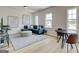 Relaxing living room with lots of natural light and an adjacent dining area at 43 Avian Way # 3B, Auburn, GA 30011