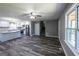 Spacious open-concept kitchen and living area featuring modern finishes and plenty of natural light at 1919 101 S Hwy, Temple, GA 30179