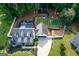 Aerial view of home showcasing expansive backyard and football field at 870 Rutherford Dr, Dacula, GA 30019