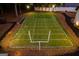 Amazing backyard featuring a custom-built football field with yard lines and goal posts at 870 Rutherford Dr, Dacula, GA 30019
