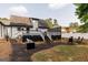 Expansive backyard featuring multiple deck and patio spaces for entertaining and relaxing at 870 Rutherford Dr, Dacula, GA 30019