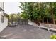 Deck features seating area with a view of the landscaped backyard at 870 Rutherford Dr, Dacula, GA 30019