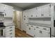 Well-designed kitchen with granite counters, stainless steel appliances, and white subway tile backsplash at 870 Rutherford Dr, Dacula, GA 30019