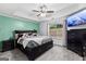 Cozy bedroom with tray ceiling, large window, and ample closet space at 11765 Fairway Overlook, Fayetteville, GA 30215