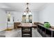 Dining area with tile floors and a chandelier at 11765 Fairway Overlook, Fayetteville, GA 30215