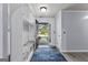 Inviting entryway with built-in storage and a view of the outdoors at 11765 Fairway Overlook, Fayetteville, GA 30215