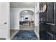 Open-concept living room with fireplace and modern decor at 11765 Fairway Overlook, Fayetteville, GA 30215